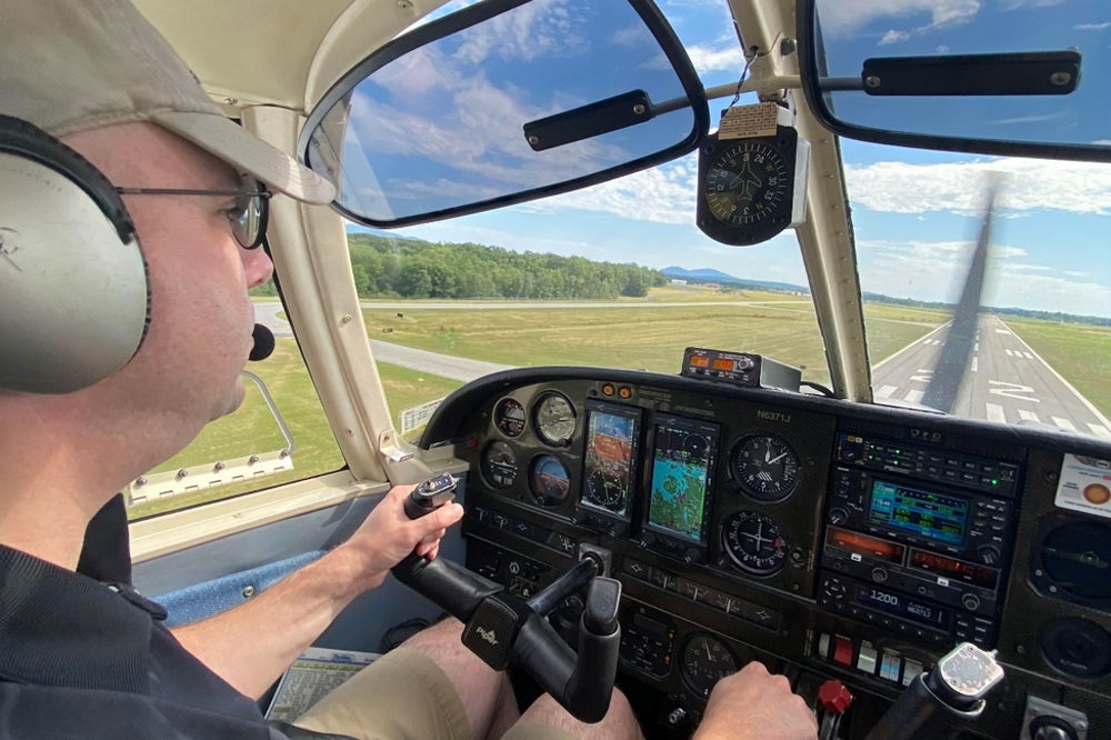 Pilot landing a small plane