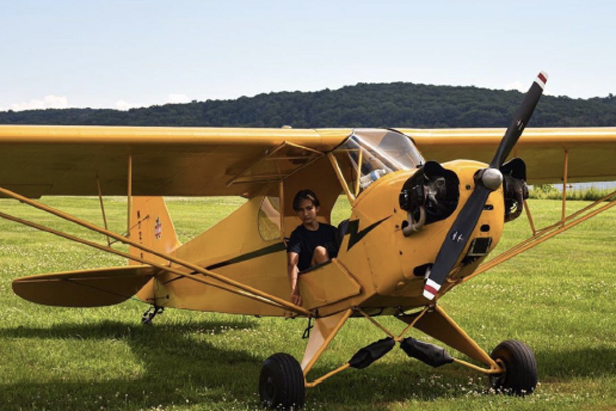 Luc Zipkin in his Piper J3 Cub