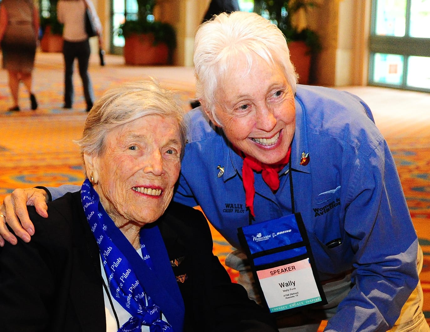 Wally Funk at the Women in Aviation International conference with an attendee.